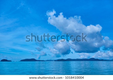 Dreamy island in Andaman ocean with exotic blue sky, Phuket, Thailand.
