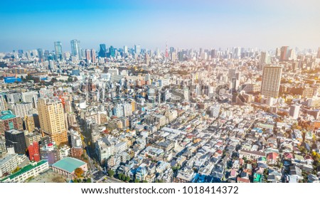 Asia Business concept for real estate and corporate construction - panoramic modern city skyline aerial view of tokyo under blue sky in Tokyo, Japan