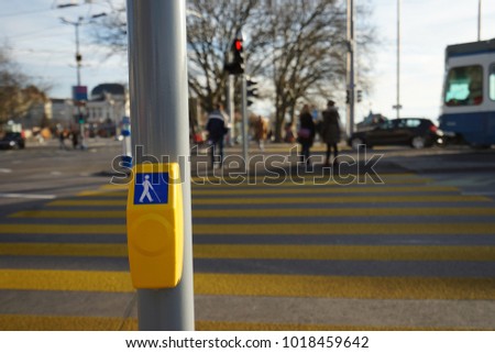 Yellow button for the blind for crossing the road 