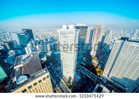 Asia Business concept for real estate and corporate construction - panoramic modern city skyline aerial view of Shinjuku area under blue sky in Tokyo, Japan