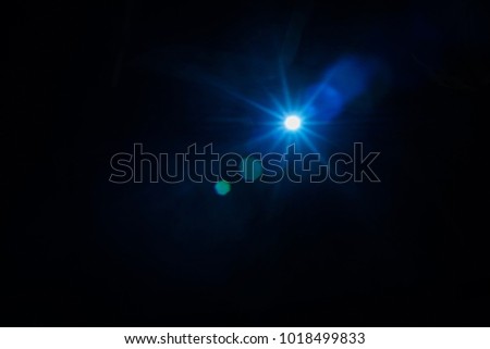 Luminous sparkle star light on dark background.