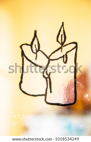  Candle light drawn on the glass ,decoration ,christmas ,interior ,window ,picture ,hand made ,holiday ,ornament ,black ,white background ,simple ,mood
