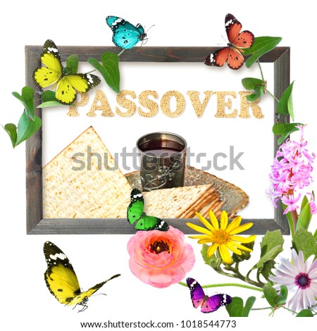 Wooden picture frame created with beautiful wild flowers and butterflies. Pesach Passover symbol of Jewish holiday. Traditional matzoh or matzo and wine in vintage silver plate and glass. Isolated  
