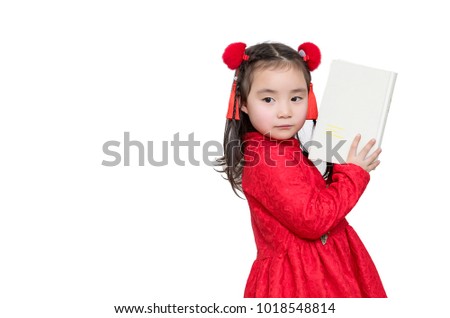 The lovely asian girl in the new year holds a book in front of the white background