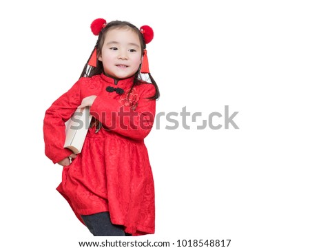 The lovely asian girl in the new year holds a book in front of the white background