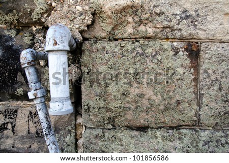 image from exterior building material texture background series (stone, cement, concrete, rock, stucco with water pipes)