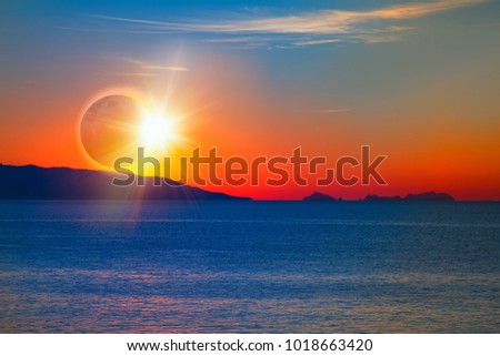 Solar Eclipse with sunset"Elements of this image furnished by NASA "