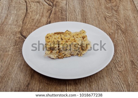 Millet with sour cabbage on a wooden table. Vegetarian food
