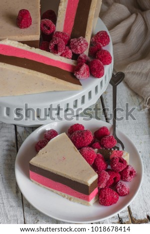 multilayer jelly cake - dessert with berries and chocolate (cheesecake)