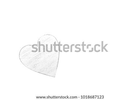 White wooden heart on black and white cardboard background