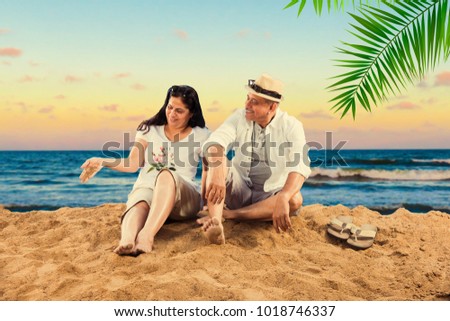 Senior Indian/Asian couple at beach