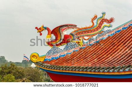 dragon on chinese temple roof in thailand