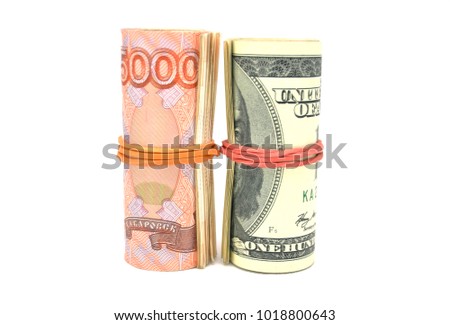 Dollars and rubles on a white background close-up. Money, currency, business, Finance