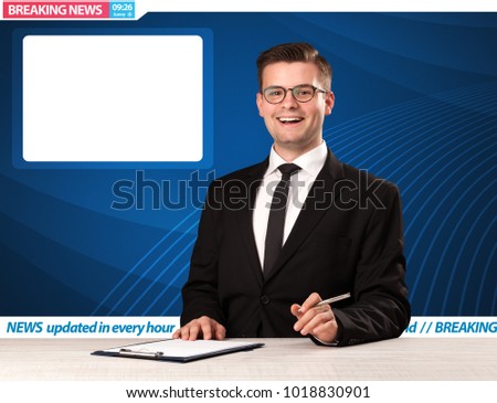 Television reporter telling breaking news at his studio desk with copy space concept