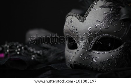 Venetian Mask, against black background Royalty-Free Stock Photo #101885197