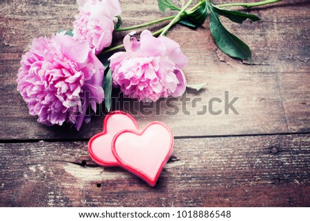 bouquet of roses and peonies on wooden board, Valentines Day background