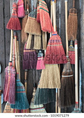 Colorful Brooms cleaning product Texture and background
