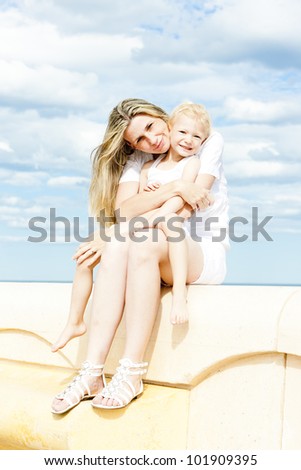summer portrait of mother with her daughter