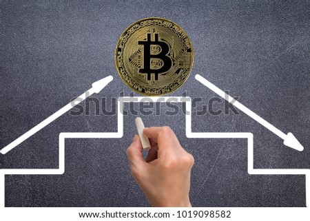Rate of bitcoin growth graph with white chalk on a black chalkboard
