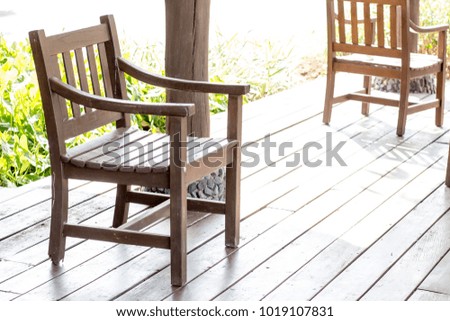 Wood chair in the restaurant on nature background with copy space.