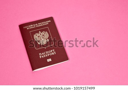 russian passport on pink background