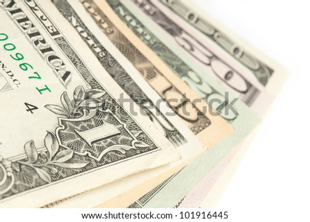 stack of money on white isolated background.  Studio photo.