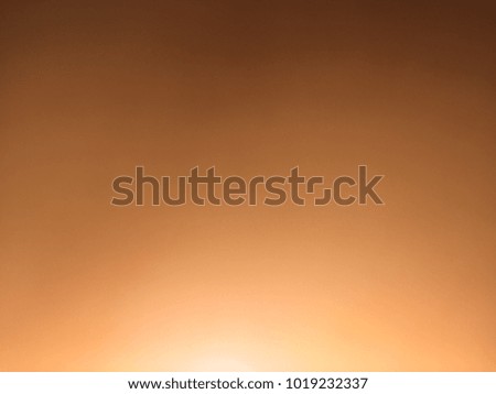 Abstract blurred background orange color with smooth gradient for banner header or sidebar graphic.Creative by mobile phone camera.