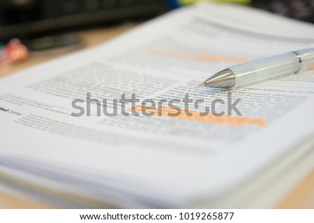 Pencil placed on scientific journal paper with highlight color   Royalty-Free Stock Photo #1019265877