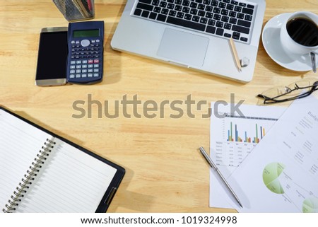 Business office stationary with laptop on top wooden table