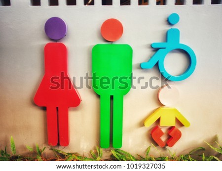 The symbol of the male toilet. The symbol of the female toilet. Toilet symbol of the disabled. Baby's Bathroom Symbol.