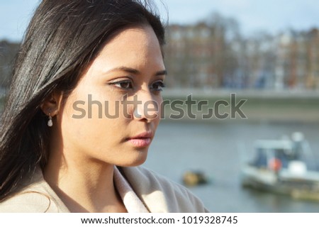 Asian woman alone in the park