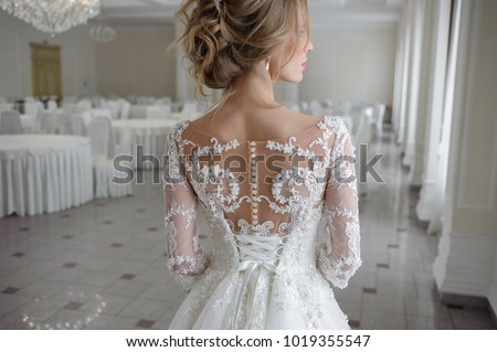 bride in a wedding dress from behind