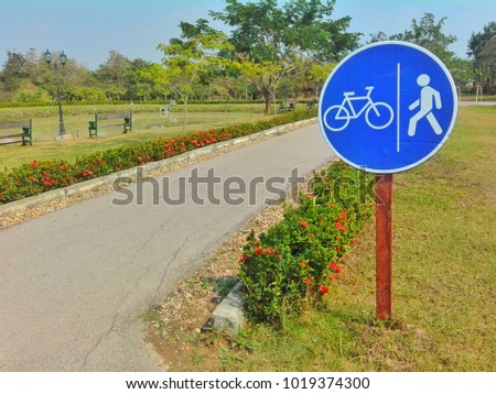 Bicycle and pedestrian zone sign in the park.
