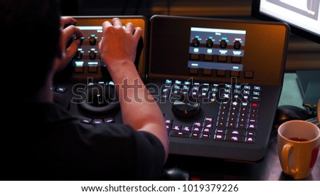 Telecine controller machine for editing or adjusting color on digital video movie or film in the post production stage. 