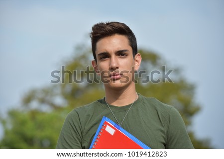 Serious Hispanic Male Teen Military Student Royalty-Free Stock Photo #1019412823