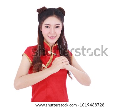beautiful woman wear red cheongsam with gesture of congratulation in concept of happy chinese new year isolated on white background