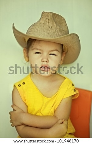 Child in a straw hat