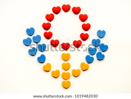 A flower made from many hearts. Photo of 3d-printed objects. White background.