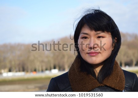 Chinese woman in park