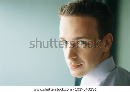 Close up of businessman's smiling face