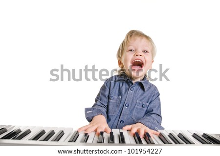 playing and singing little boy on white background
