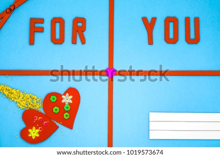 Greeting card "For You" with hearts on colored background