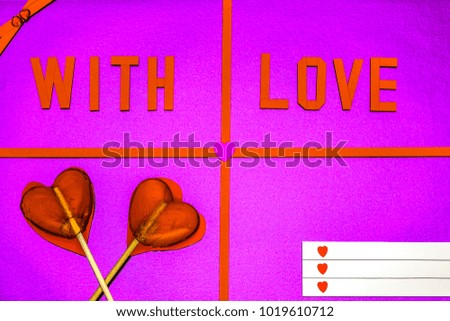 Greeting card "With love" with hearts on colored background