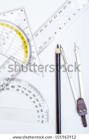 Drawing tools on a paper. Close-up photo