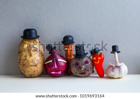 Mister potato red onion beetroot garlic pepper carrot. Old fashion style characters plants, serious faces and black hats. Gray background. Vegetarian food concept