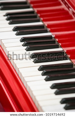 Close up view of red piano keys  