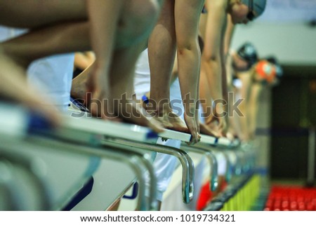 Close up of swimming competition at the big pool Royalty-Free Stock Photo #1019734321
