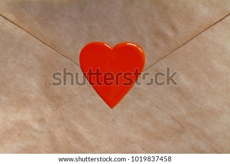 St. Valentine's day background, heart on a paper envelope