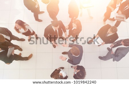 business concept.business partners talking in the lobby of the office