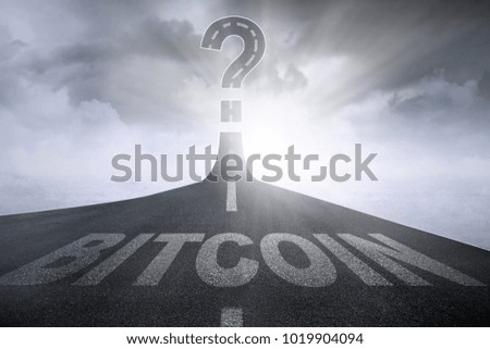 Picture of bitcoin word with question mark symbol on the empty road